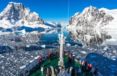 How to visit antarctica. Antarctica is the ice-covered continent that surrounds the South Pole and is itself surrounded by the Southern Ocean. It is the fifth largest land mass on the planet. 