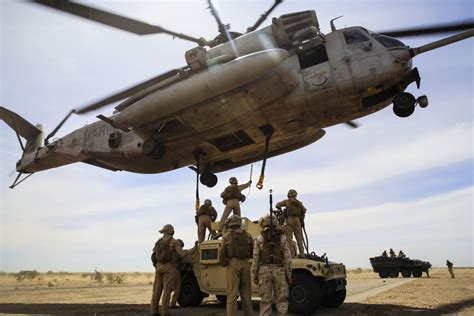 USS RUSHMORE -- When Marines need essential gear, vehicles or equipment in the field, they need it quickly. The helicopter support team, a group of landing support specialists, is called to support this vital mission.During the …. 