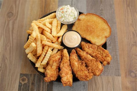 Huey magoos asheville. Serves approx. 15. 75 Tenders, 2 Signature Magoo’s Dips, 2 Catering Sides, 15 Pieces of Texas Toast, 2 Gal. Of Iced Tea/Lemonade, 1 Sweet. $11.33 per person. 15270 – 39550 CAL. 