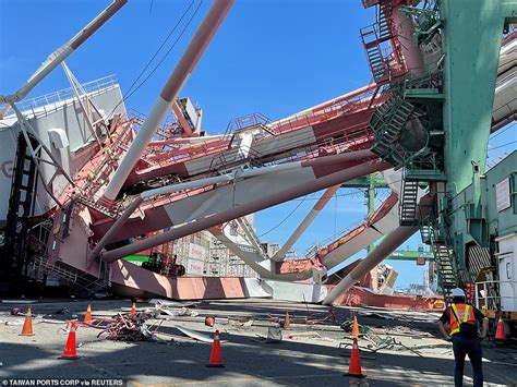 Huge 80,000-tonne cargo ship smashes into dock toppling a crane …