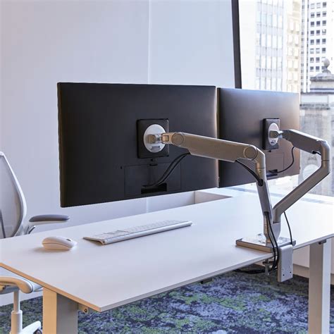 Humanscale monitor arms. M/Flex for M2.1 M8.1 and M10. QUICK SHIP. M/Flex with M2.1 Monitor Arm with 25mm Sliding Desk Clamp Mount, Polished Aluminium with White Trim. Item Code: X215BW. 