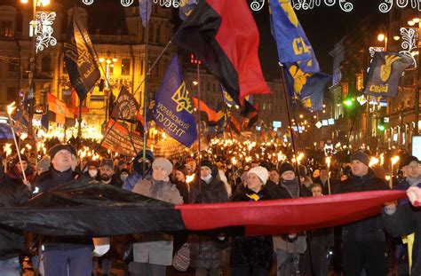 Hundreds of Ukrainian nationalists march in honor of …