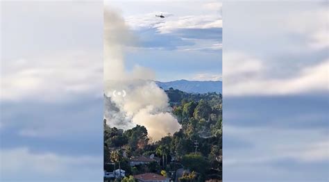 Hundreds of firefighters battle massive blaze at construction site in Encino 