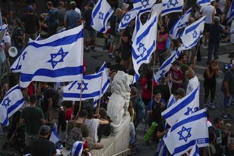 Hundreds of thousands march in Israel. Former security chiefs beg Netanyahu to halt legal overhaul