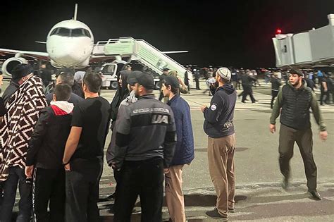 Hundreds storm Russian airport in antisemitic riot over plane from Israel