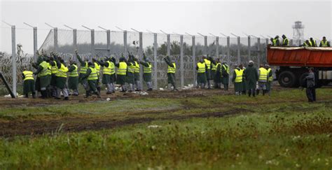 Hungarian law forcing migrants to seek asylum abroad is illegal, top EU court rules