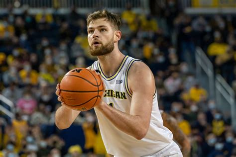 Michigan center Hunter Dickinson (1) goes to the basket against Toledo during the first round of the NIT at Crisler Center in Ann Arbor on Tuesday, March 14, 2023.. 