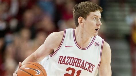 Hunter Mickelson's free throw snapped a 70-all tie, and C.J. Jones sank a corner three for the Razorback alumni to trigger the first Elam Ending of 2021. J.D. Miller paced the former Frogs with .... 
