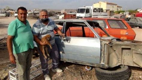 Hurda aracın alt kısmına sıkışan köpek kurtarıldı
