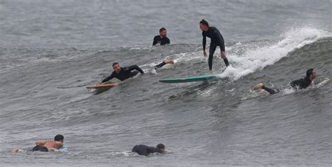 Hurricane Franklin fires off waves in Rhode Island, sending surfers flocking to the water [+gallery]