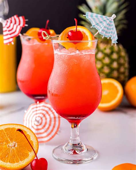 Hurricane drink recipe. Preparation: First, rim your desired glass with ingredient of your choice (salt, sugar, chili salt, etc.) then fill with ice. Next, pour all ingredients into a shaker. Shake or stir and pour over ice. Finally, garnish with an orange slice and a cherry. Enjoy! 