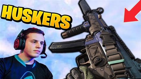 NICKMERCS’ Origin shotgun class is an absolute beast, and is best paired with a medium to long-range AR in a loadout, such as a Grau or a Kilo. For perks, Overkill, E.O.D, and Amped are the order of the day, while a Heartbeat Sensor and C4 are his tactical and lethal equipment.. 