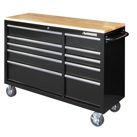 The all new Husky Extra-Deep 46 in. 9-Drawer Mobile Work Bench has arrived. This work bench is 24.5 in. D, which creates 36% more storage capacity than traditional 18 in. D units. The extra-depth also ... I have 9 husky tool boxes, these last to are great one problem is had is , #1 box had chrome handle,#2 box had black. #1 had husky logo .... 