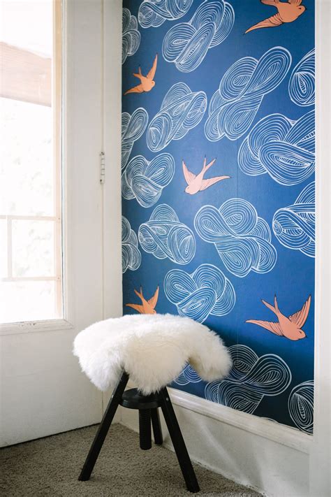 Hygge and west. About Foret Wallpaper. The interesting flowers, unique animals, and intricate vignettes of this pattern were inspired by 1600s Indian Chintz wallhangings, but updated for a thoroughly modern aesthetic. Designed in collaboration with Julia Rothman. Wallpaper spec sheet. 