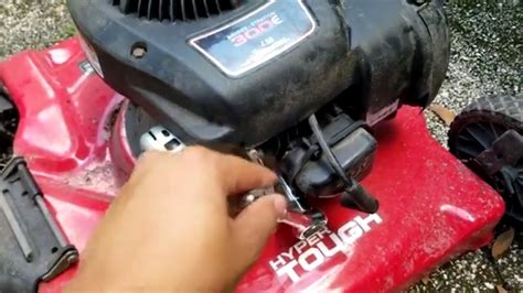 Hyper tough lawn mower won't start. Step: 1. Drain the Gas Tank and Pull the Spark Plug Wire. If your lawn mower is flooded, much gasoline will likely be sitting in the bottom of the engine compartment. Before attempting to fix a flooded lawn mower, you need to drain this fuel out so that it doesn’t cause any problems later on. 