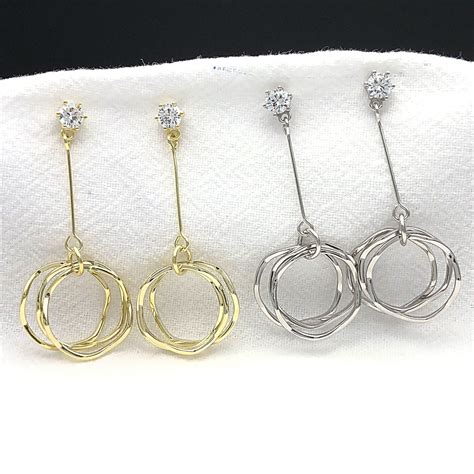 Hypoallergenic jewelry. Fashion Womens Austrian Crystal Flower Dangle Drop Earrings 14K Gold Plated Hypoallergenic Jewelry. EVEVIC's Austrian crystal flower drop earrings are made of hypoallergenic 14k gold plated brass, Ensuring comfort and durability. The crystal's high gloss finish adds a touch of luxury, Making it the perfect choice for fashion lovers. ... 