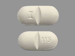 M 2 Pill White Round 9mm - Pill Identifier
