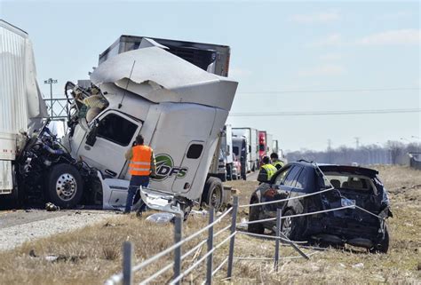 Three people died in the crash on westbound Interstate 70 in Highland, Illinois, and multiple others were taken to a hospital with serious injuries, police said.. 