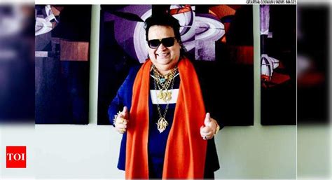 I will wear saffron scarves with my sunglasses and gold chains: Bappi ...