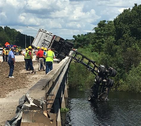 BAY COUNTY, Mich. (WJRT) - A semi-truck crash blocked part of northbound I-75 near Bay City on Friday, causing traffic backups for motorists. A truck hauling sand tipped onto its side and spilled ...