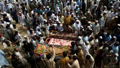 IS claims responsibility for deadly suicide bombing at rally that killed 54 in northwest Pakistan