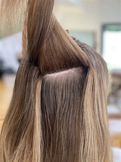 Ibe hair extensions. Sep 8, 2023 ... A stylist installs IBE extensions. Courtesy of Invisible Bead Extensions. Getting certified in installing hand-tied hair extensions may just be ... 