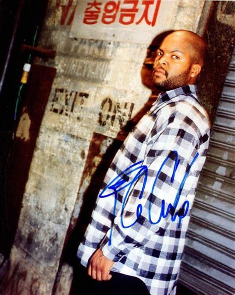 The image pays tribute to Ice Cube's 1991 record cover for Death Certificate, which showed him standing over a dead body, also covered by the American flag, with a tag which said "Uncle Sam.". 