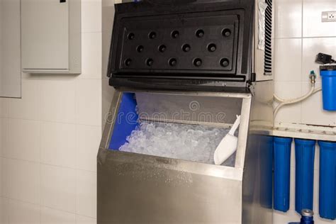 Ice cubes store in ice making machine for clean product. Ice cube …