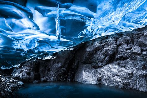 Iceland ice cave. Breiðamerkurjökull. Stop: 30 minutes. We will meet you at the meeting location, before heading on Super Jeep transfer to the base of the glacier and then up to the ice cave. You will not have to walk far to enter the ice cave, but once there you can enjoy the gorgeous blue ice. Read more. 