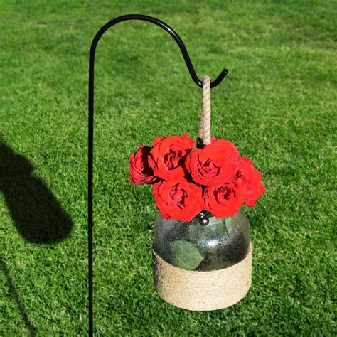 Ideas for shepherd hooks. Durable & Rugged. These heavy-duty shepherd's hooks are capable of holding an impressive amount of weight. Durable and made to last. Constructed of solid, 0.25" thick steel. Sturdy enough to hold everything from bird feeders to flower pots. Withstands wind. Powder-coated finish holds up to harsh weather. 