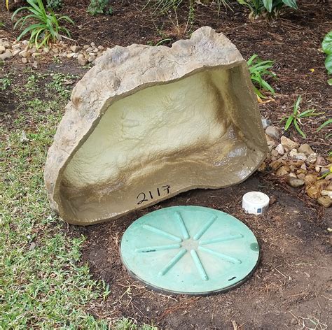 The bird bath sits on top of the cover. Septic Tank Systems. Septic Mound Landscaping. Garden Fencing. Front Yard. Artificial Rock Covers Septic Tank Covers Home Design Backyard. Jun 26, 2019 - Explore Andrea Young's board "How to hide the Septic Lids...." on Pinterest. See more ideas about septic tank covers, backyard landscaping, septic tank.