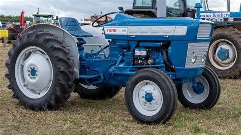 Identify ford tractor. Ford Row-Crop tractor: Built in Highland Park, Michigan, USA: Original price was $5,400 in 1967: Variants: 5100: general purpose 5200: row-crop Ford 5000 Engines: Ford 3.8L 4-cyl gasoline: Ford 3.8L 4-cyl diesel: Engine details ... Ford 5000 Transmissions: 8-speed: 10-speed full power shift: 16-speed partial power shift: 
