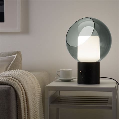 Bedside tables. Bedside tables are unsung heroes, keeping your nighttime necessities within reach. Ours come in different styles, so you can easily find a bedside table to match your other bedroom furniture. Some have doors or drawers where you can charge your phone and hide that guilty pleasure bestseller, too. Check out our range of table lamps.