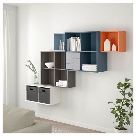 EKET Storage combination with legs, white dark gray/wood, 133/4x133/4x311/2" With the EKET series you can build your storage big, small, colorful or discreet to either display or hide your things. And if your space and needs change, you can easily change your EKET solution too.. Ikea eket ideas