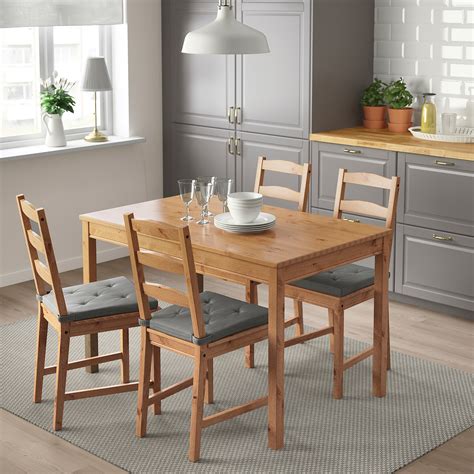 Ikea jokkmokk table and chairs. A simple and sturdy set that's perfect for your breakfast nook or smaller dining area. The solid pine holds up well over time and will endure all the family ... 