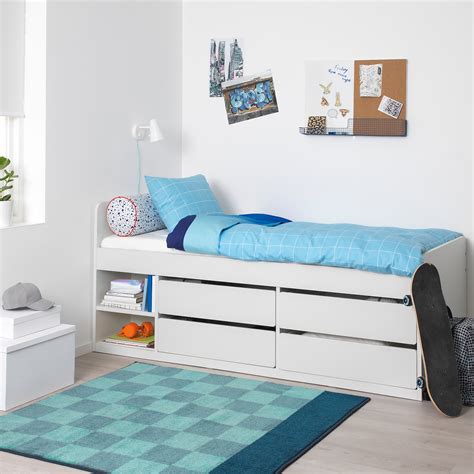 SLÄKT Bed frame w/storage+slatted bedbase, white, Twin A teenager's dream. A nice bed with lots of storage that swallows up everything. Allowing you to store all of your teen's …. 