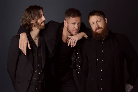 Imagine dragons members with their instruments