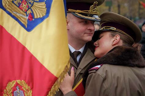 In Romania, tens of thousands attend a military parade to mark Great Union Day