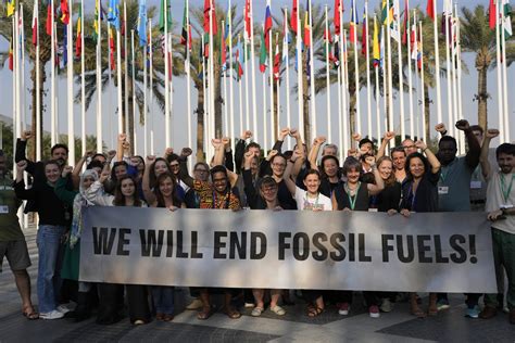 In a first, delegates at UN climate talks agree to transition away from planet-warming fossil fuels