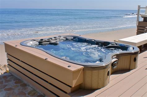 In deck hot tub. Sinking a hot tub right into a deck elevates both, turning what could be a tacky eyesore into a classy chill zone. This recessed hot tub is spacious, but … 