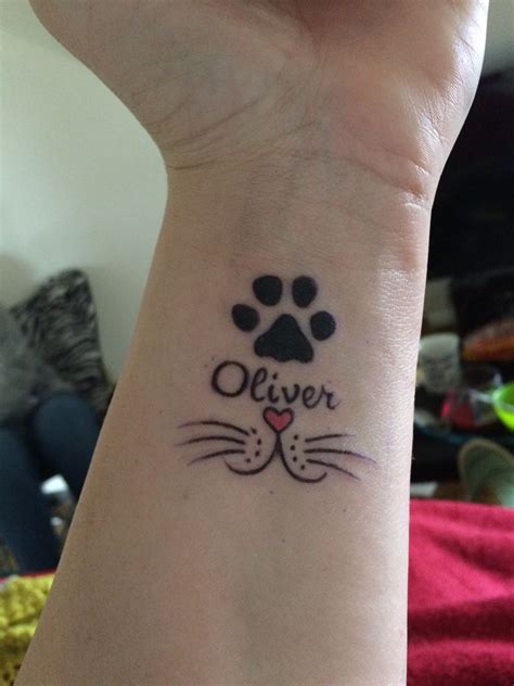 Apr 21, 2022 · This incredible cat paw print tattoo is the be