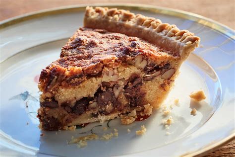 Ina garten pecan pie. Nov 16, 2023 · A family recipe from former Test Kitchen Professional Pam Lolley, the pie includes all the familiar ingredients: a butter-shortening pie crust, and a filling made with corn syrup, vanilla, eggs ... 
