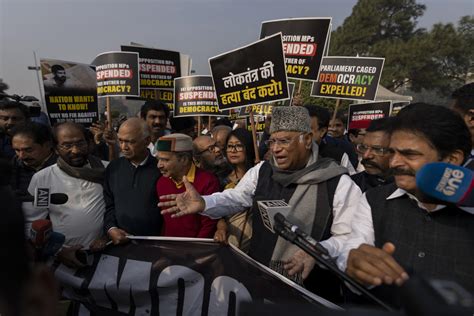 India’s opposition lawmakers protest their suspension from Parliament by the government