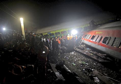 India train crash death toll rises above 230 with 900 injured as rescuers comb through debris