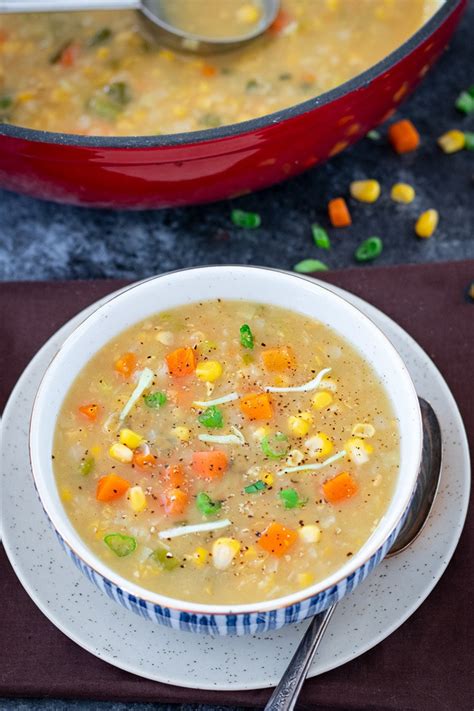 Tags. To make sweet corn and vegetable soup, combine the cornflour and ¼ cup of water in a small bowl and mix well till the cornflour dissolves completely. Keep aside. Heat the butter in a deep non-stick pan, add the ginger and garlic and sauté on a medium flame for a few seconds.. 