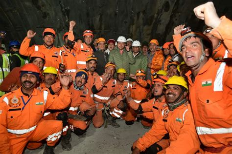 Indian rescuers pull out all 41 workers who were trapped in a tunnel for 17 days