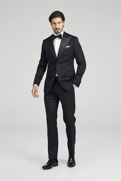 Indochino tuxedo. Milano Black Suit. USD $599 Luxury. Sourced from the Guabello mill in Northern Italy, this fabric screams luxury. With its unique weave, the Milano has a similar stretch to a spandex-blend suit-despite being 100% wool. Not only that, but its unique dying process creates unparalleled richness and uniformity of color. Learn More. 