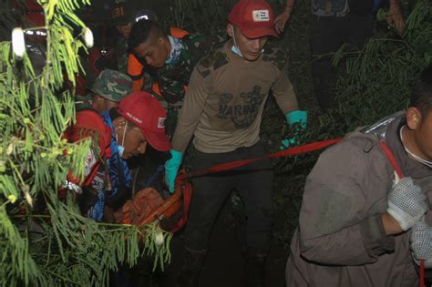 Indonesia ends volcano victim search after 23rd body found