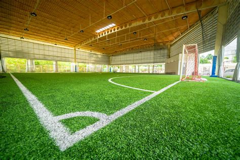 The cost of an indoor football field depends on the size, location and other factors. The average cost for a full-size indoor football field is between $1 million and $2 million, according to the Sports Turf Managers Association (STMA). The average cost of building an indoor stadium is between $15 million and $25 million, according to STMA.. 