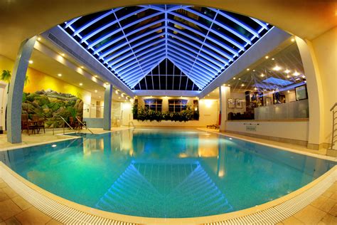 Indoor swimming pool. A professionally built indoor or outdoor swimming pool can add value to your property. You need to choose between a pre-built resin or fibre construction or a bespoke, poured concrete pool. The average cost to build an indoor pool is £152,500. The average cost to build an outdoor pool is £105,000. 